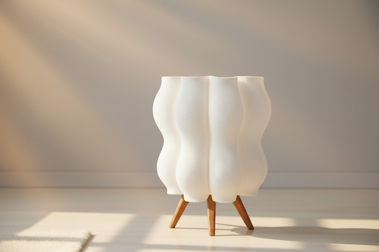 White textured chair with wooden legs on a white background